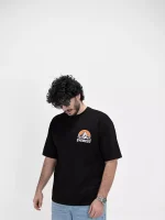 Model wearing a black everest t-shirt for men - new summer collection