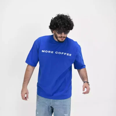 Model wearing a blue coffee t-shirt for men - new summer collection
