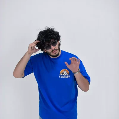 Model wearing a blue everest t-shirt for men - new summer collection