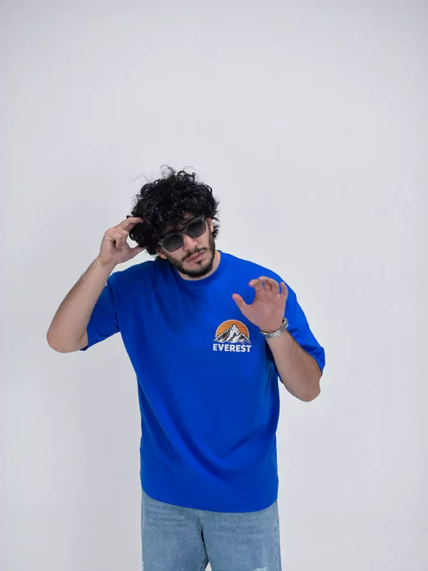Model wearing a blue everest t-shirt for men - new summer collection