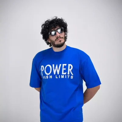 Model wearing a blue power t-shirt for men - new summer collection