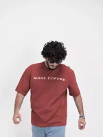 Model wearing a red coffee t-shirt for men - new summer collection