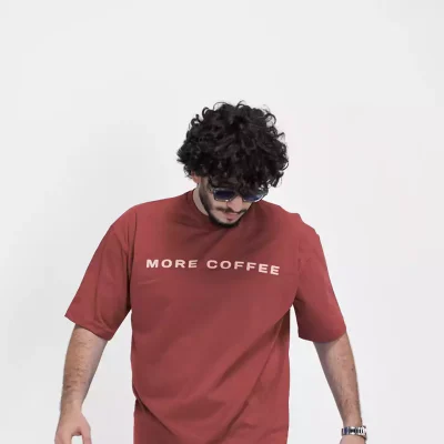 Model wearing a red coffee t-shirt for men - new summer collection