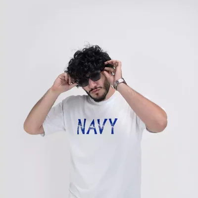 Model wearing a white navy t-shirt for men - new summer collection