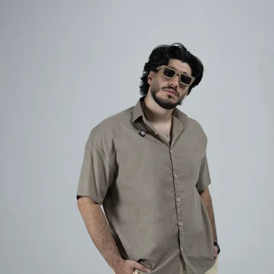 Model wearing a brown Linen Shirt for men - new summer collection