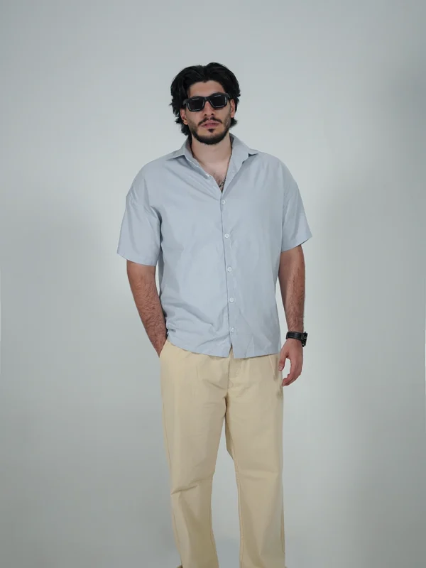 Model wearing a sky blue Linen Shirt for men - new summer collection