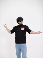 Model wearing a black NEW YORK t-shirt for men - new summer collection