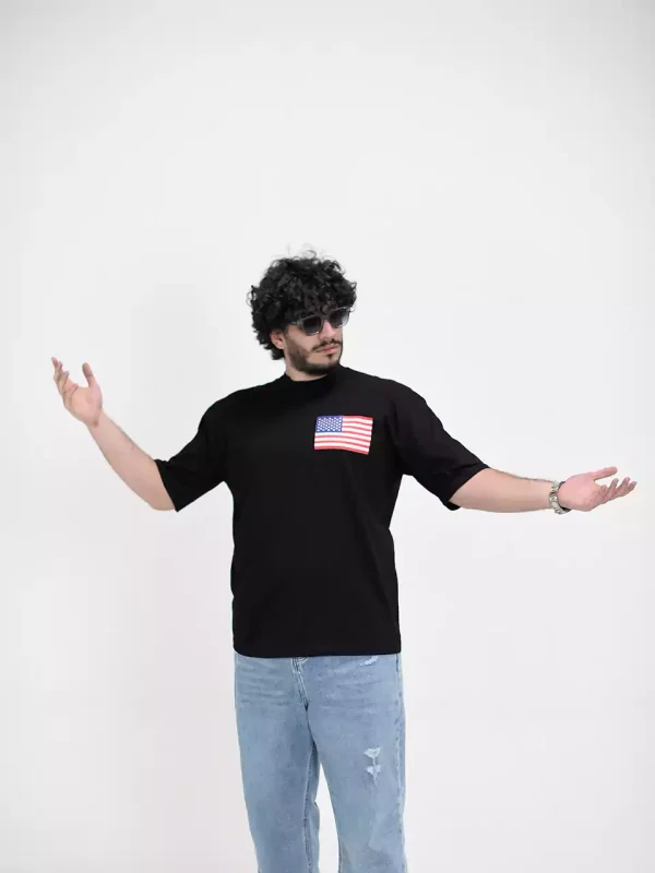 Model wearing a black NEW YORK t-shirt for men - new summer collection