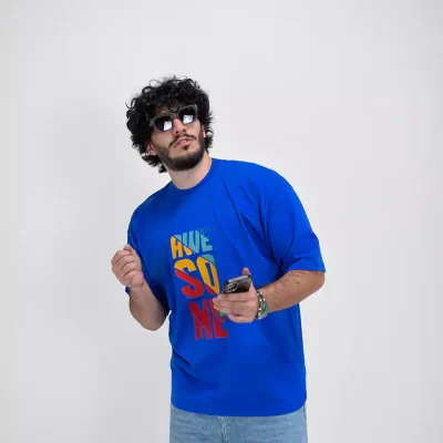 Model wearing a blue awesome t-shirt for men - new summer collection