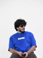 Model wearing a blue nice human t-shirt for men - new summer collection