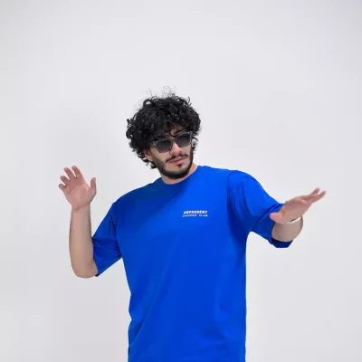 Model wearing a blue represent t-shirt for men - new summer collection