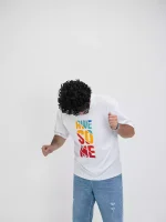 Model wearing a white awesome t-shirt for men - new summer collection