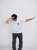Model wearing a white journey t-shirt for men - new summer collection
